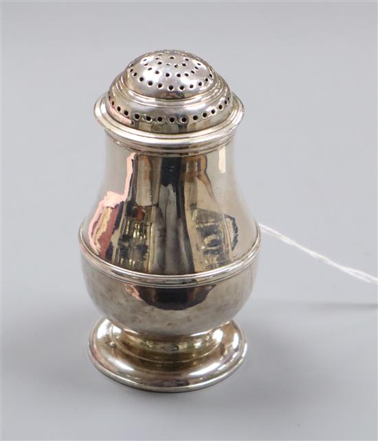 A George I Britannia standard silver bun pepper by Charles Adam, London, 1719, 3 oz.